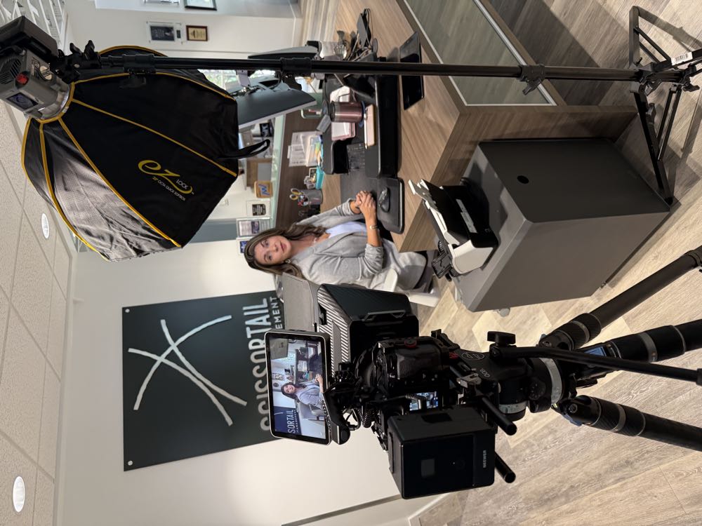 Metcalf Media filming a business owner at her own desk