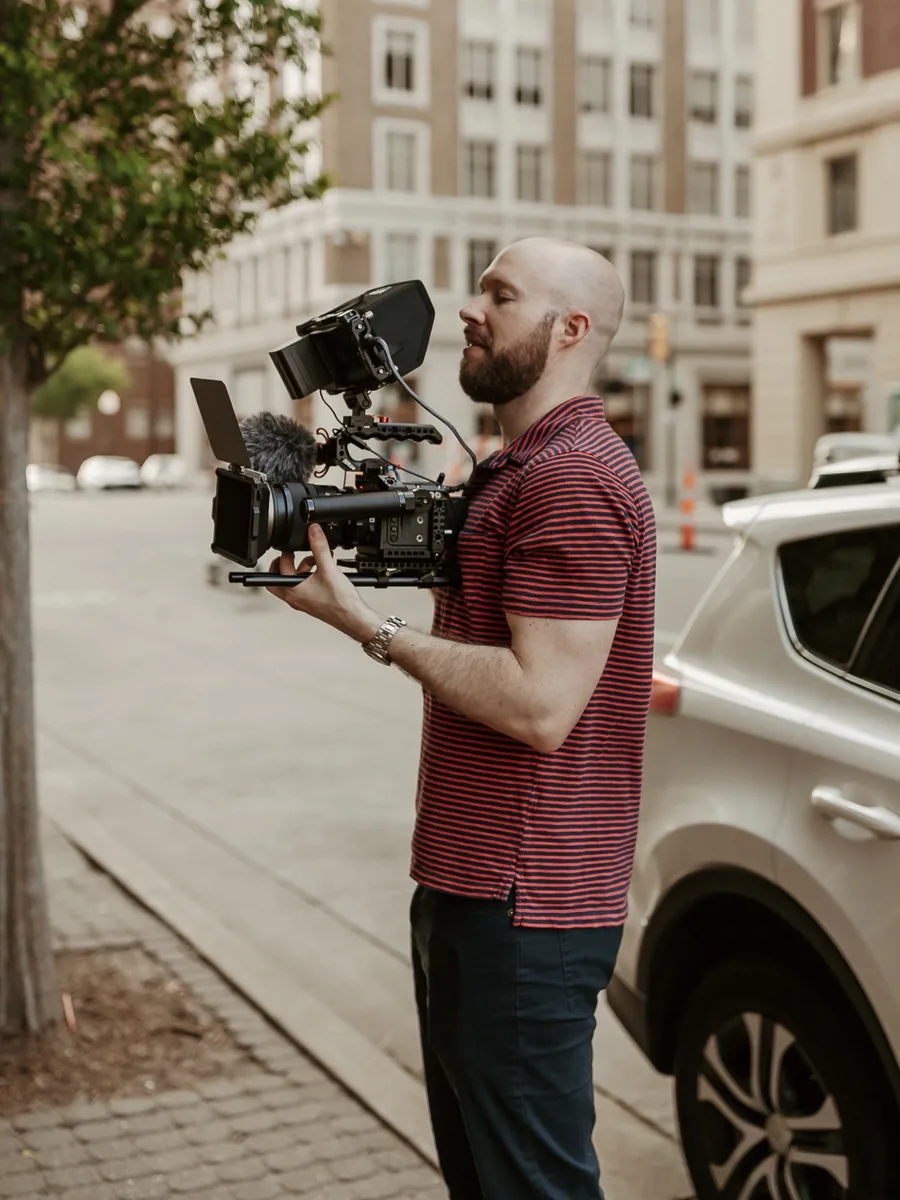 Jeffrey Metcalf shooting on location with a cinema camera